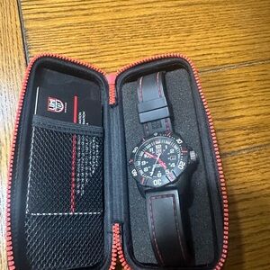 Luminox Black and Red Men's Watch with Case mint condition